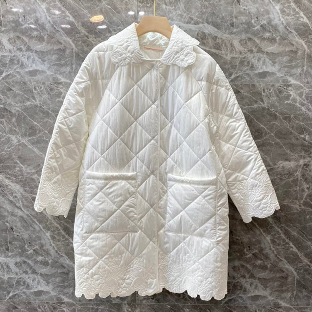 Embroidery in the long padded coat lady